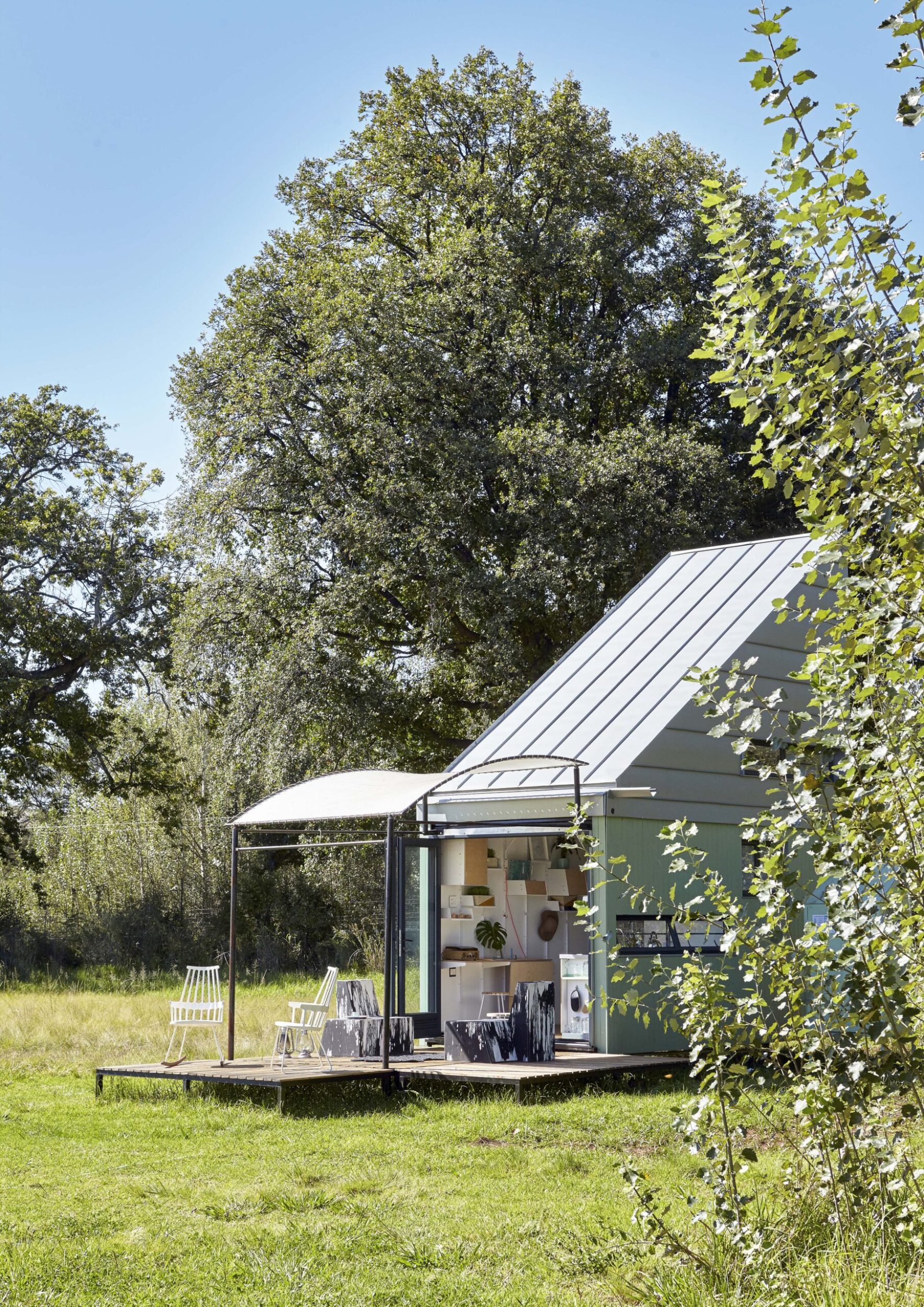 Small home in a field of grass