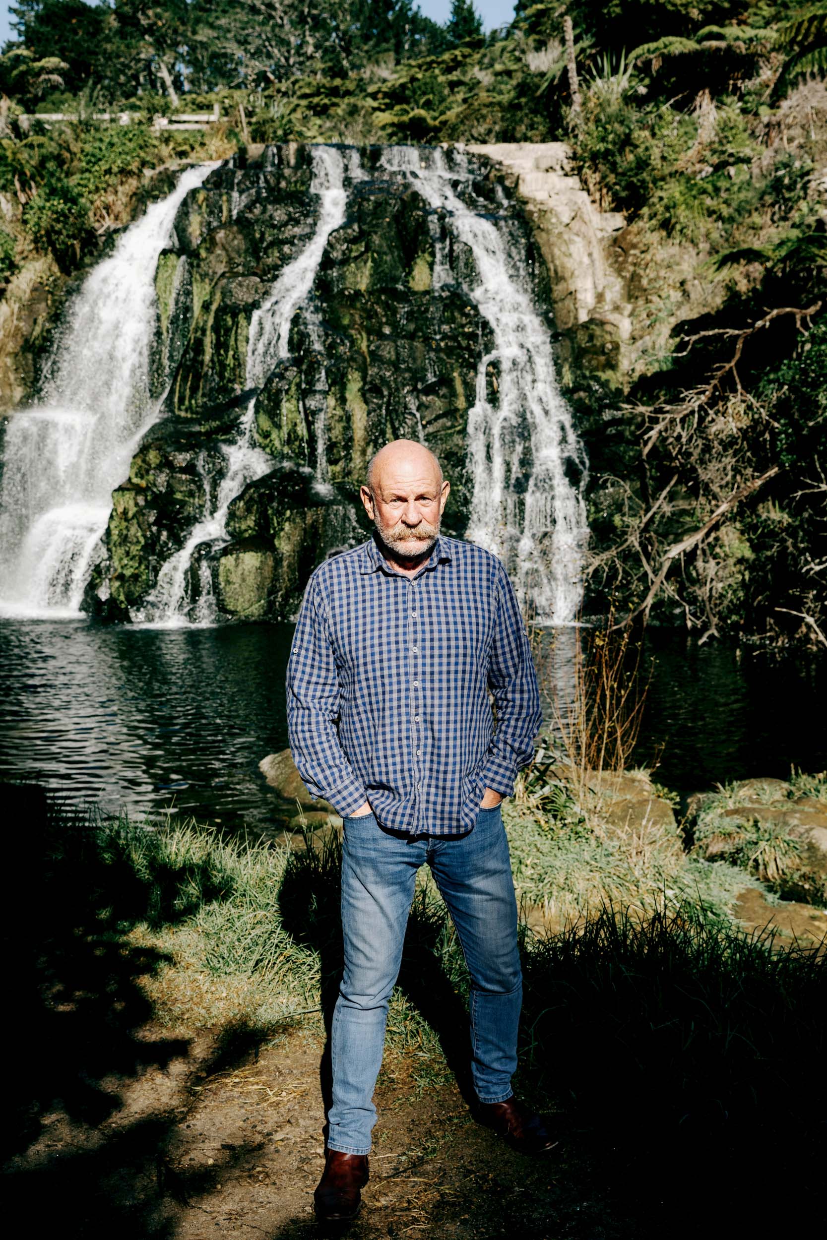 Mark Sainsbury in front of waterfall