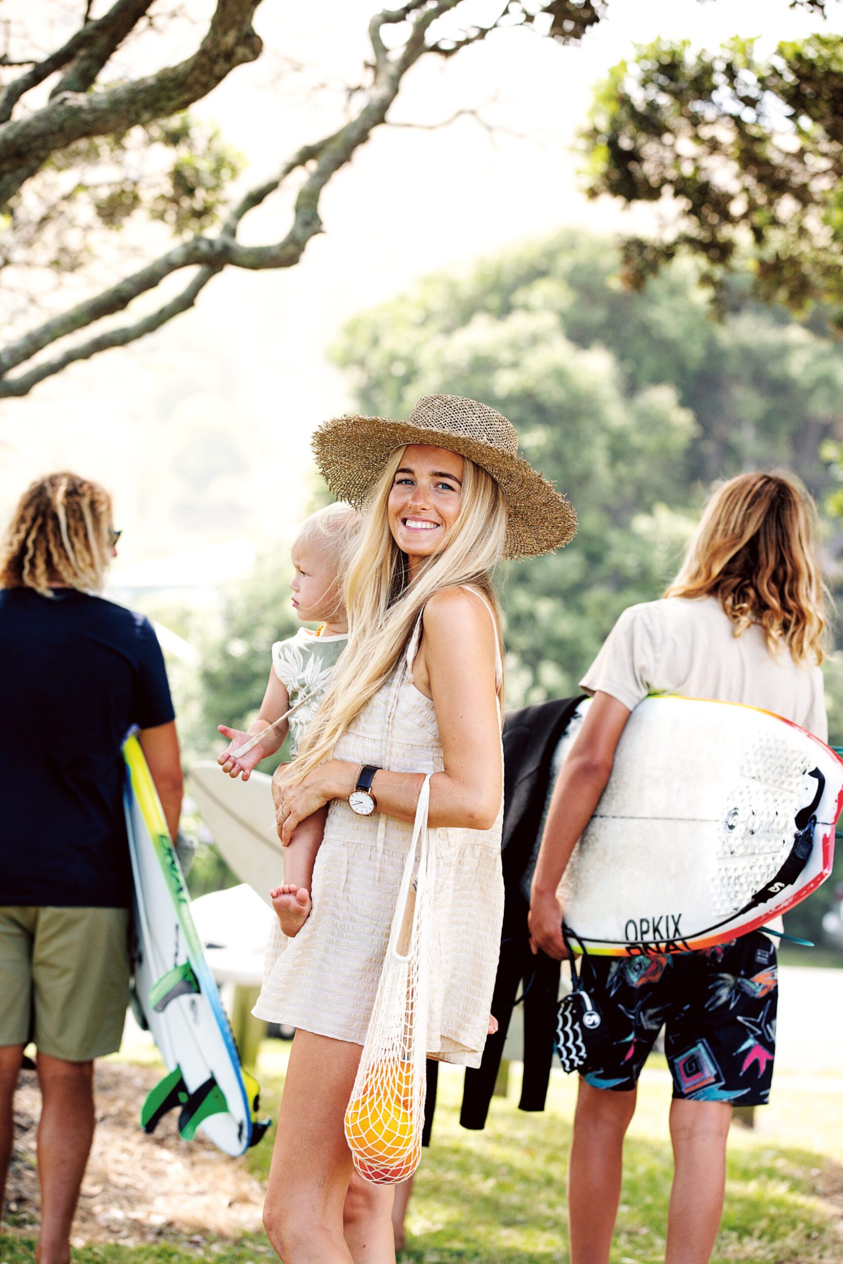 Sophie Steevens in white summer dress and hat