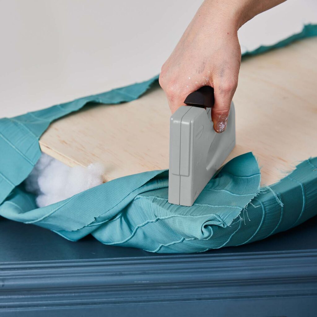 Stapling fabric for the cushion