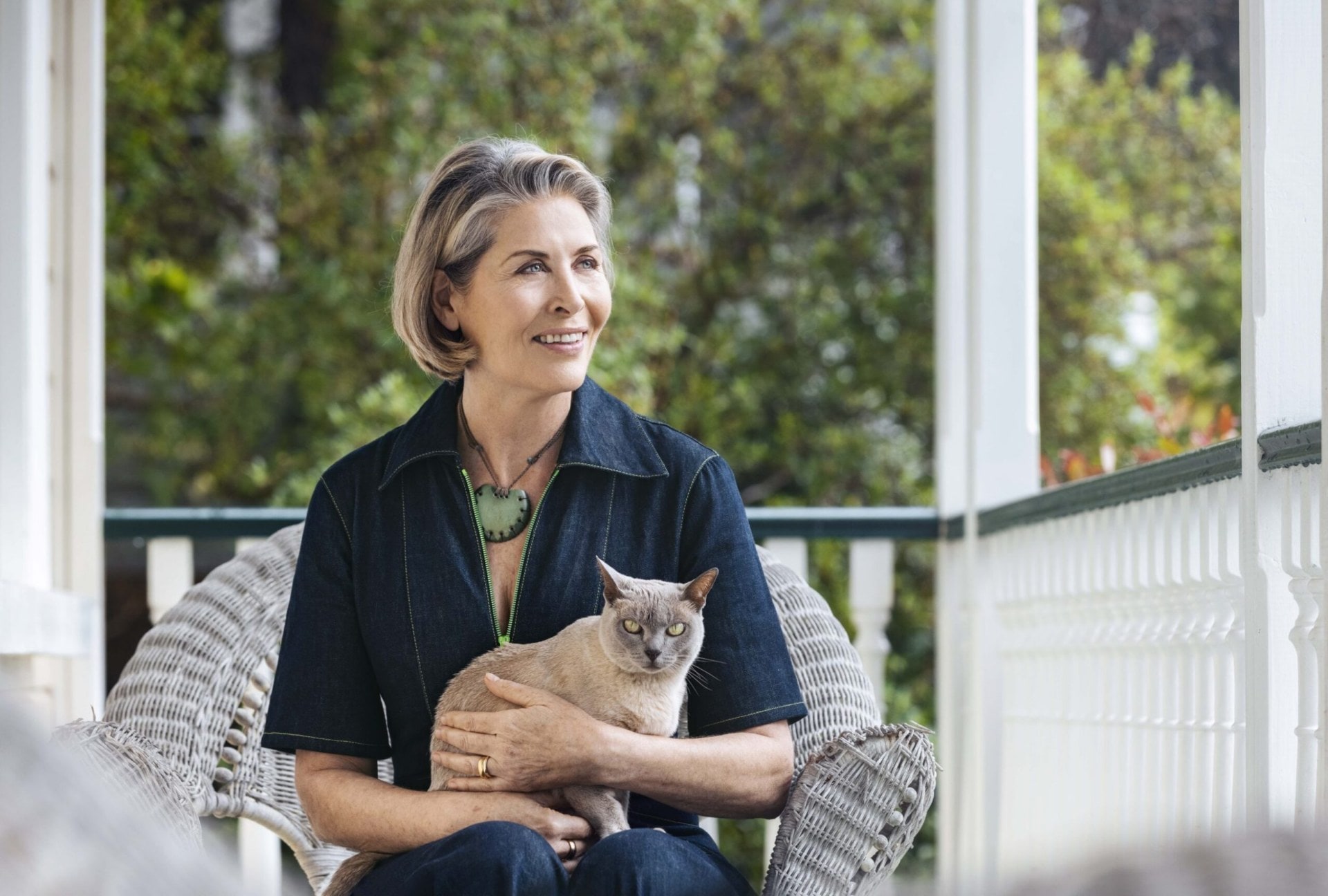 Jennifer Ward-Lealand sitting with her cat