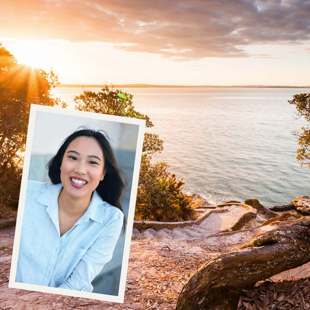 Polaroid of Xana Tang on against a picture of Point Chevalier beach at sunset