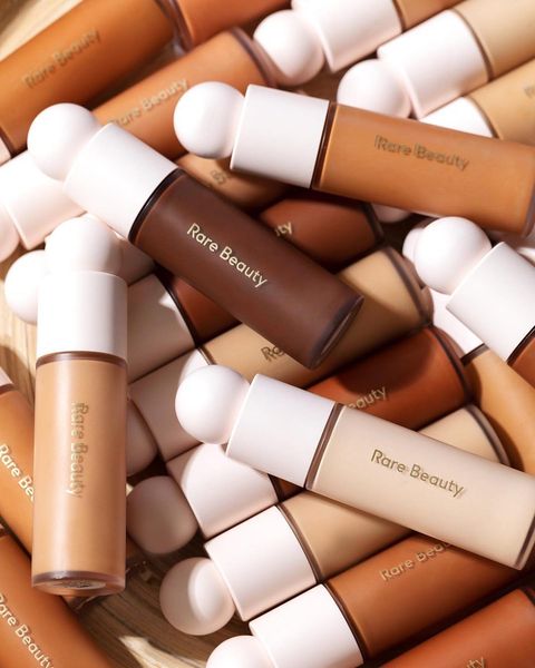 Bottles of the Rare Beauty Liquid Touch Foundation- a lightweight medium coverage foundation. 