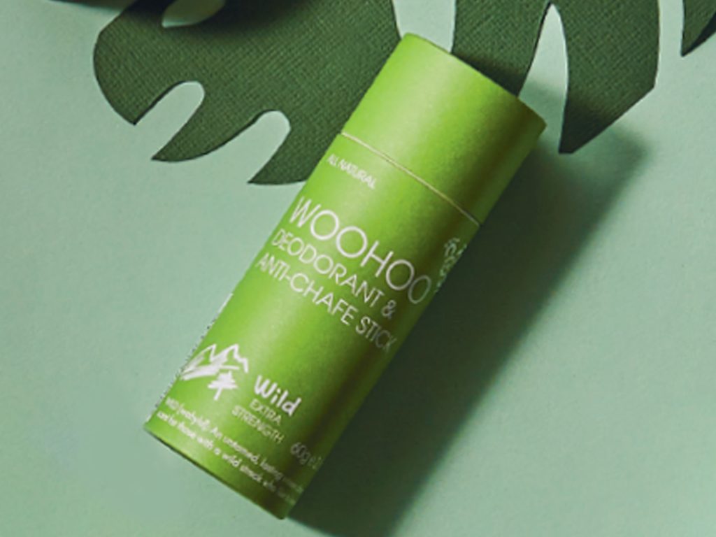 Woohoo Deodorant & Anti-chafe Stick on a green background