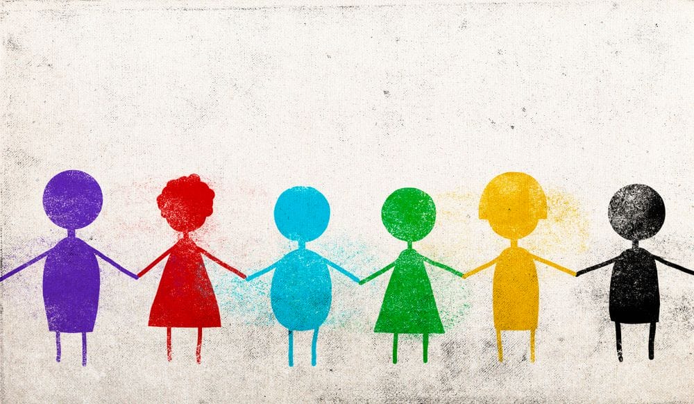 Stick figures painted different colours holding hands