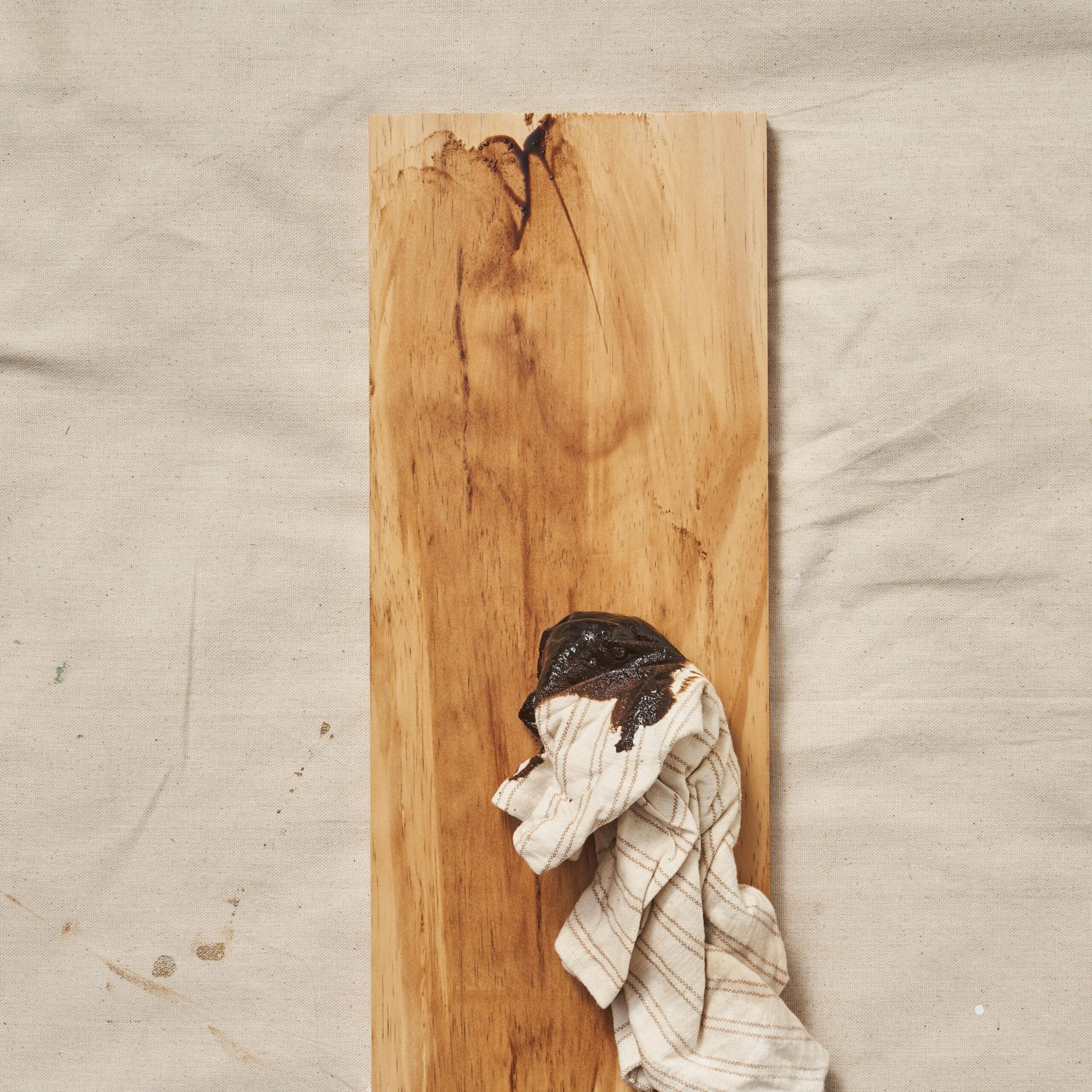 staining a wooden plank