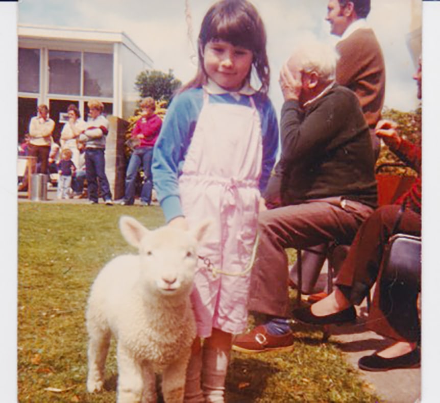 MC Tali as a child with a lamb