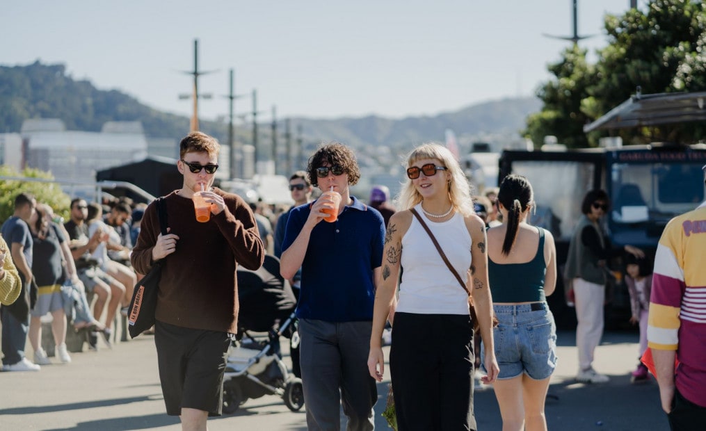 Three friends at Harbourside, a Saturday market in Wellington. 