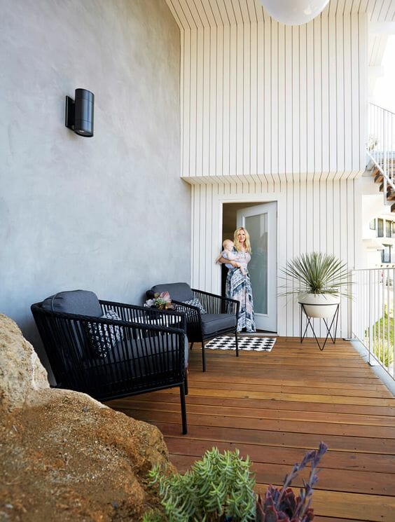 A newly stained wooden deck with a bright undertone. 