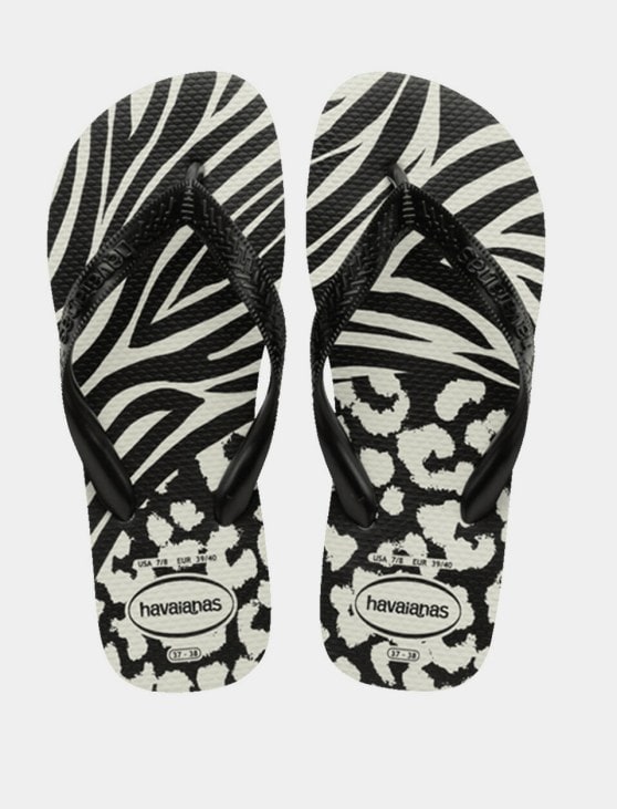 Black and white zebra and tiger print flip flops- great as a summer shoe. 