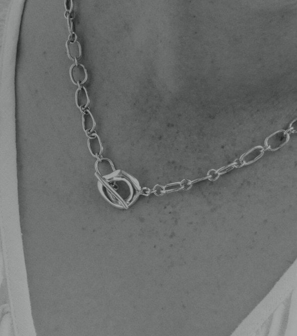 The Gossia Necklace from Pigment Studio is a silver chain summer accessory. 