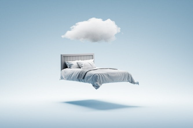 floating bed with clouds with a sky blue colour scheme. 