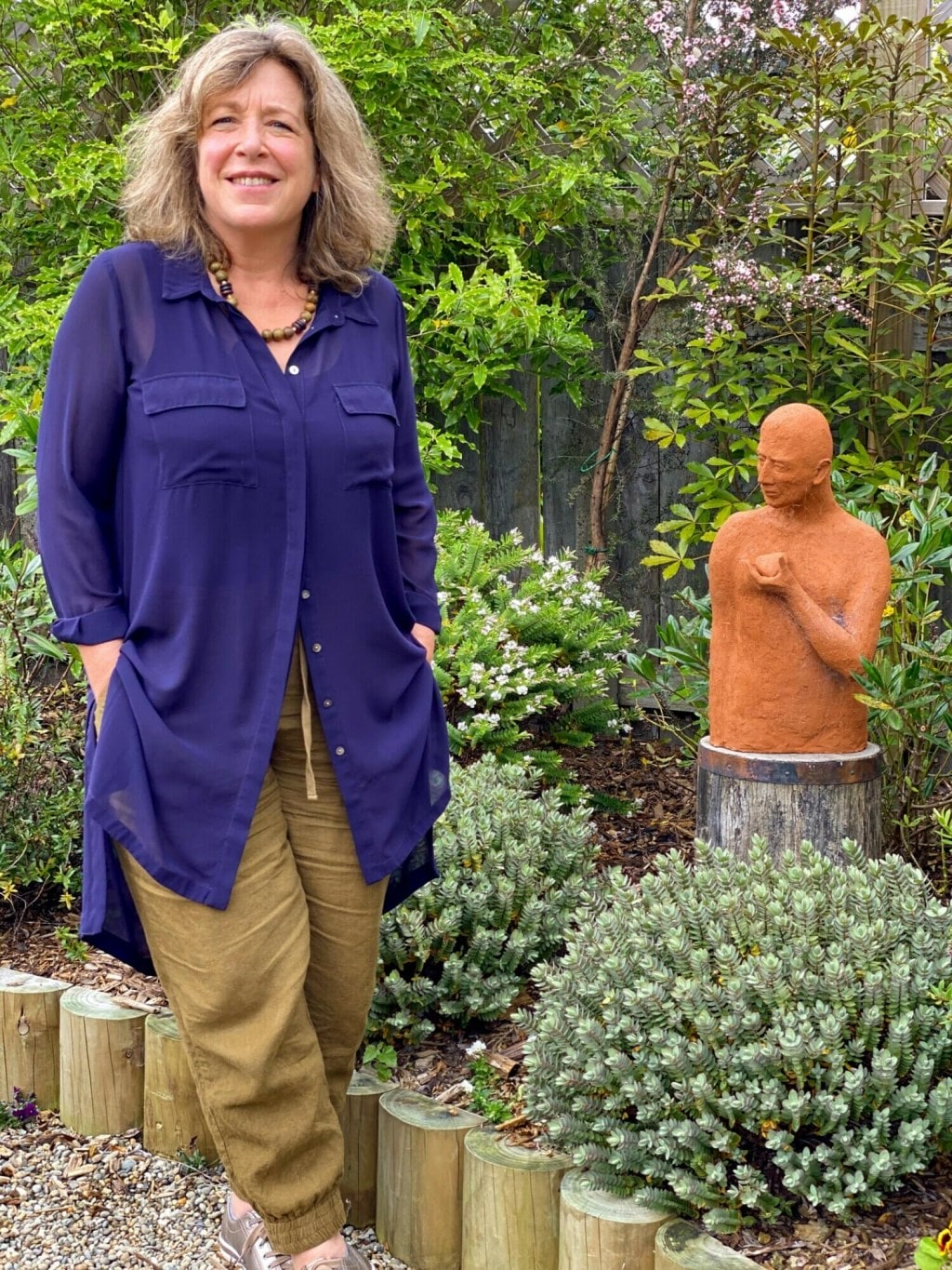 Georgina Langdale in her garden. Georgina is a herbalist and healer. 