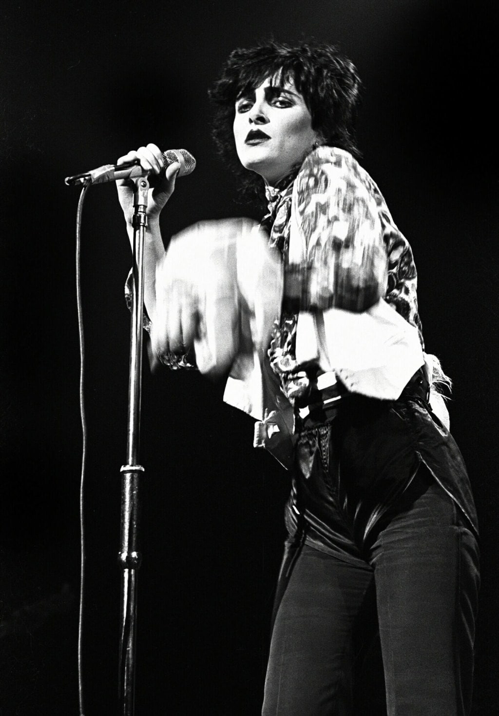 Siouxsie Sioux holding microphone
