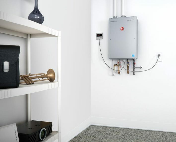 The eco-friendly tankless water heater mounted on a wall.