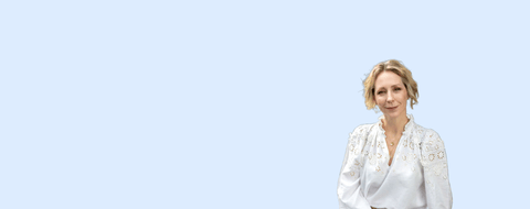 Megan Nicol Reed on a blue background