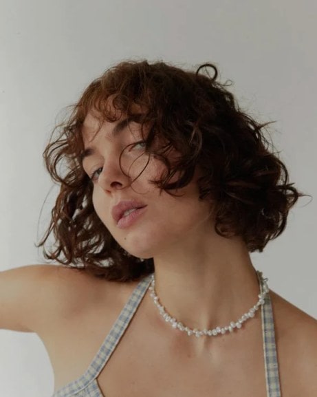 pearl necklace on model 