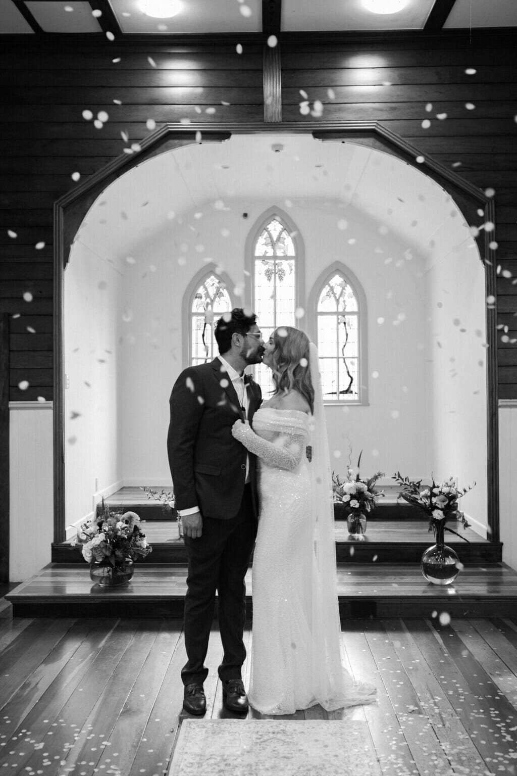 Black and white wedding photo in church