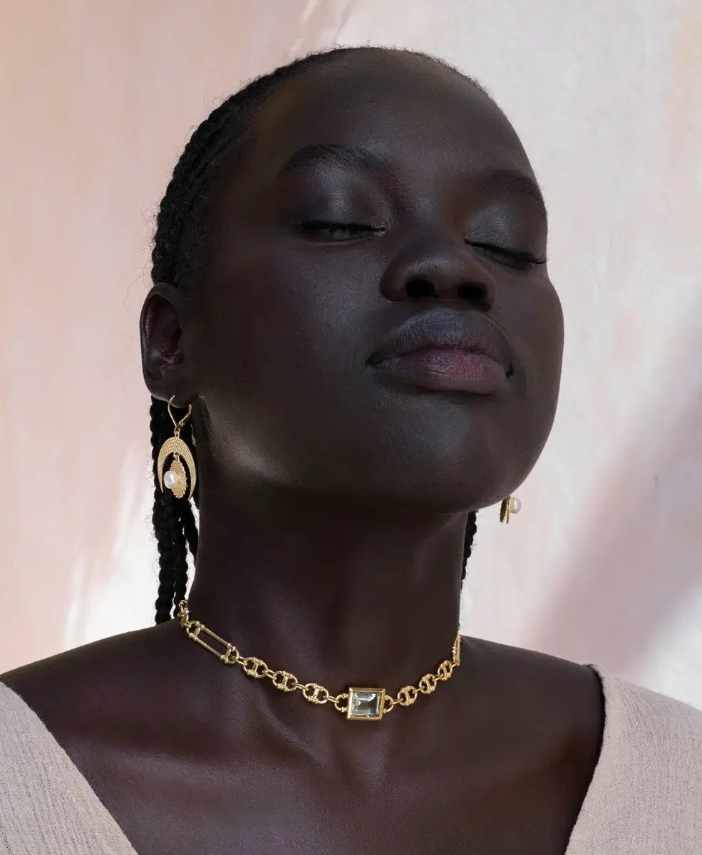 Zoe and Morgan Gold Jewellery on Model with Eyes Closed