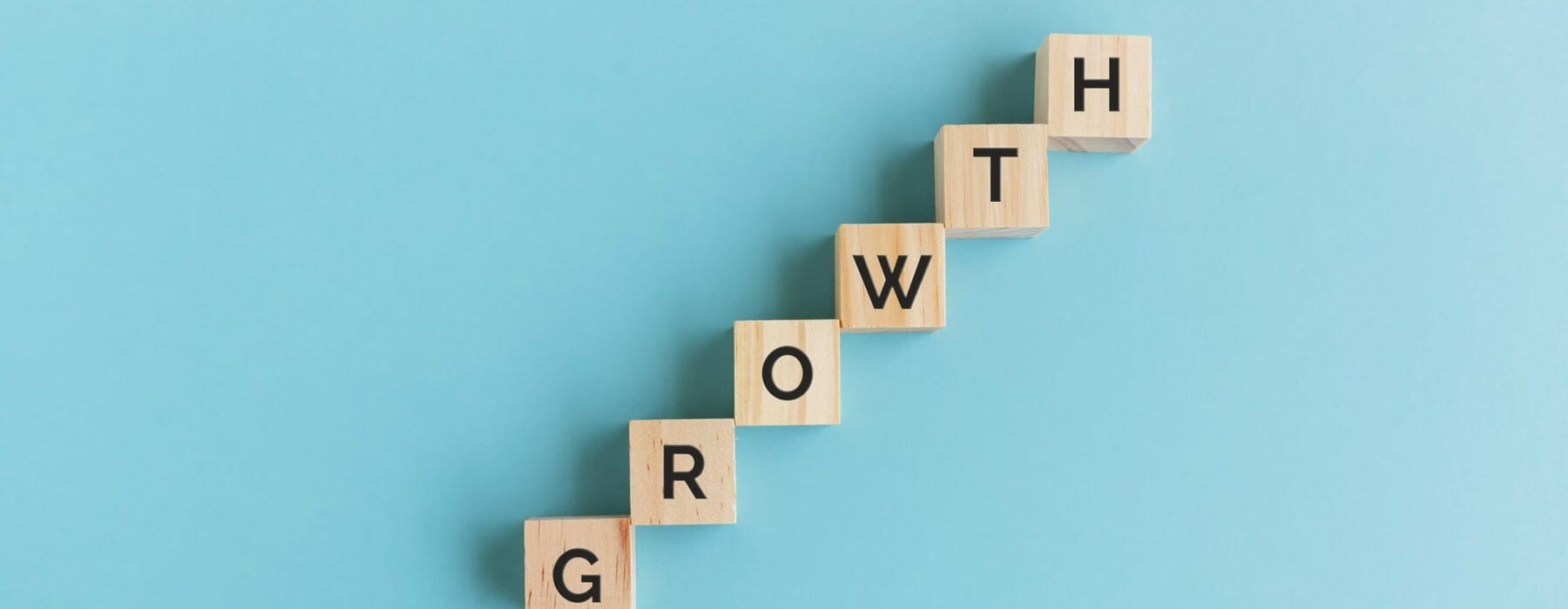 Growth Word on Wood Block