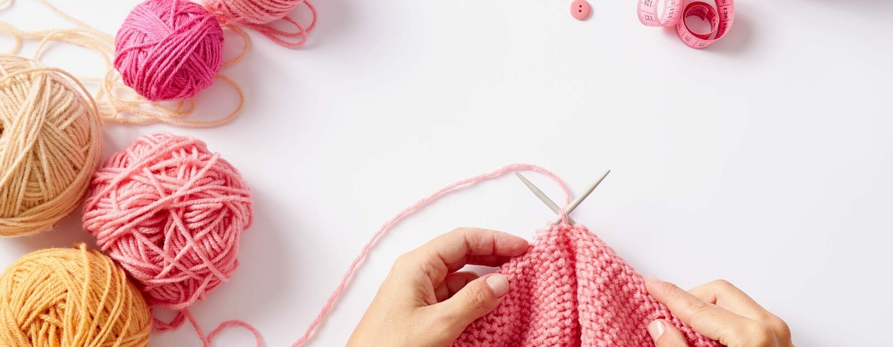 Woman hands knitting with needles and yarn