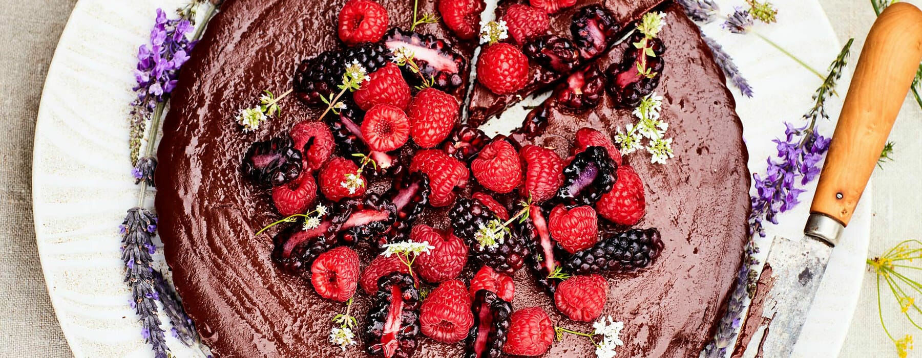 Chocolate cake with berries on top