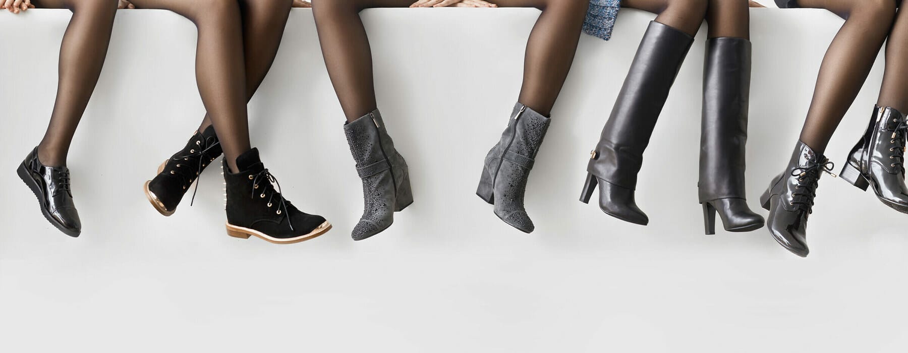 Woman's,Legs,In,Different,Shoes